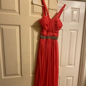 A bright pink prom dress